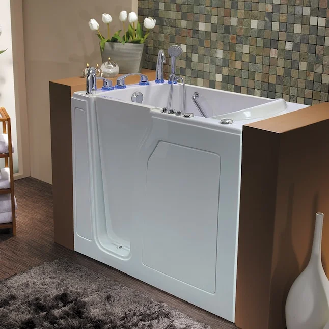 White walk-in tub with door and wood cabinetry in remodeled bathroom with glass tile backsplash